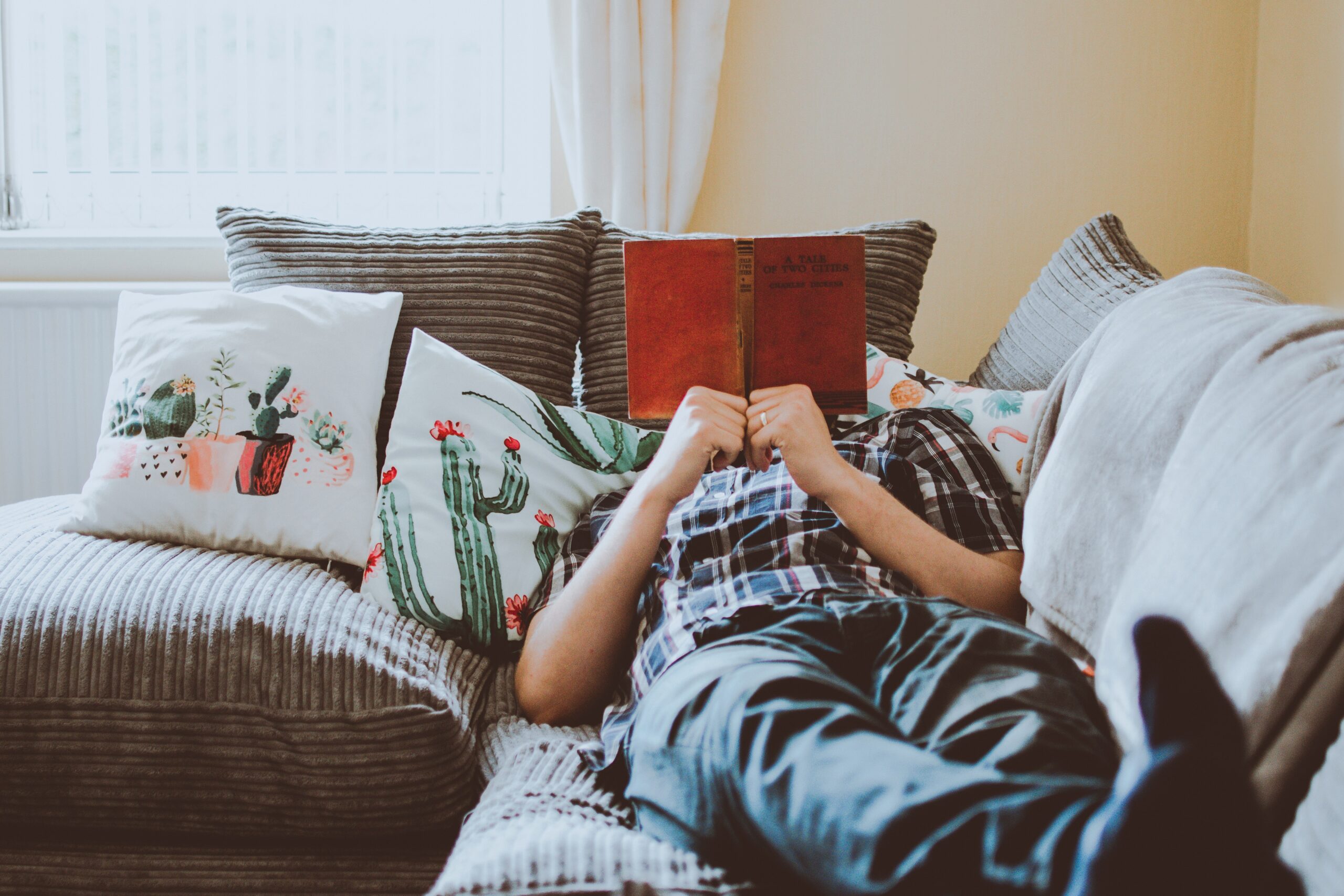 person reading on the couch